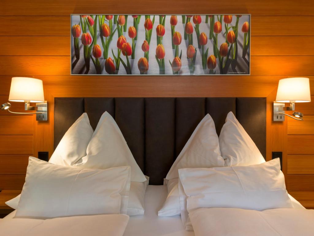 Postel nebo postele na pokoji v ubytování Hotel Zinnkrügl