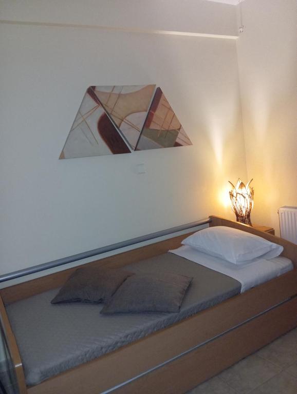 Postel nebo postele na pokoji v ubytování Garden studio