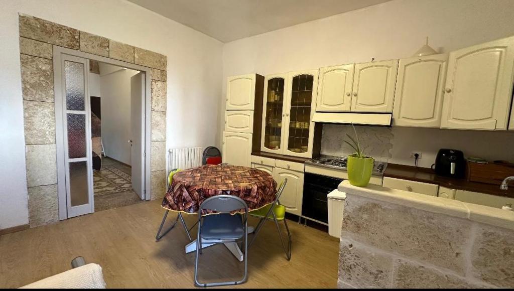 Kuchyň nebo kuchyňský kout v ubytování Casa Scarciglia