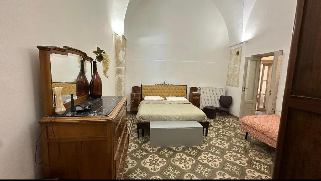 Postel nebo postele na pokoji v ubytování Casa Scarciglia