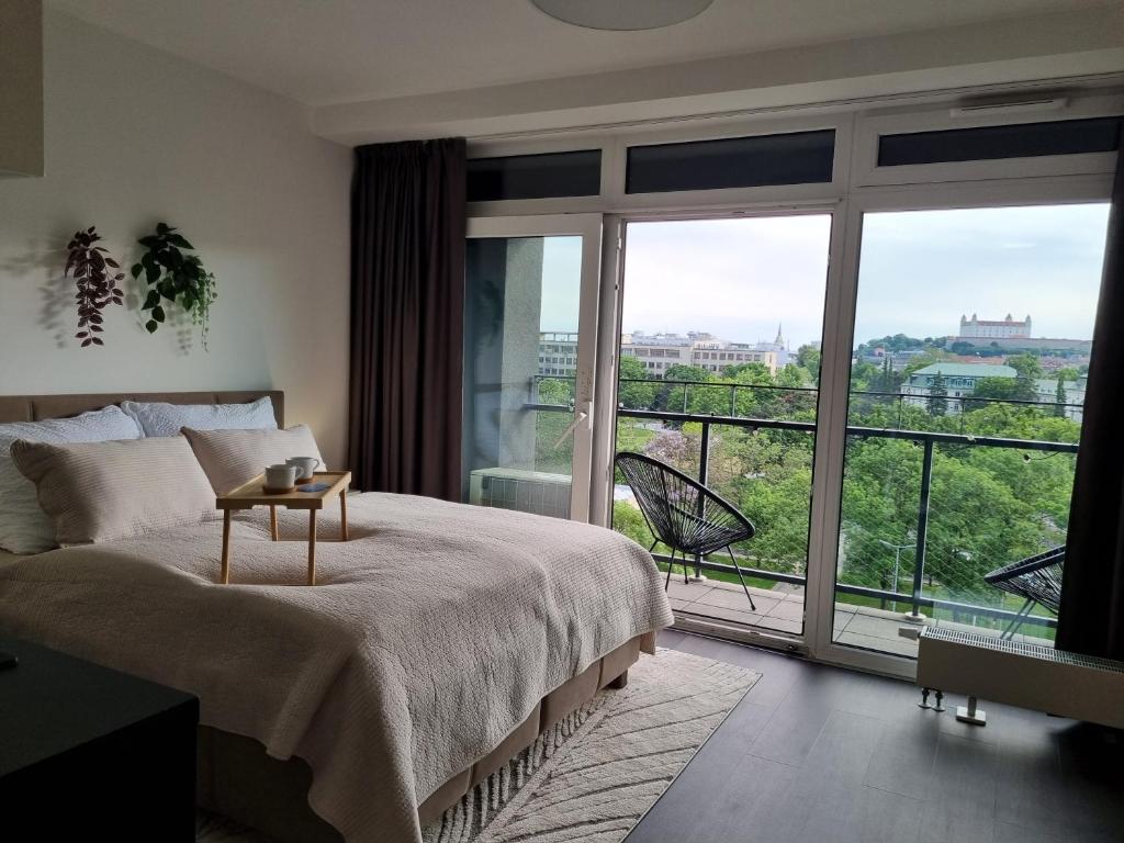 Ένα ή περισσότερα κρεβάτια σε δωμάτιο στο Sleep with the view