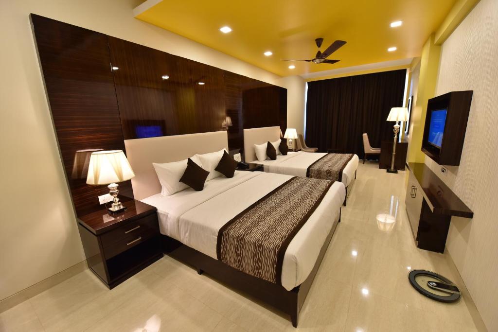 TV a/nebo společenská místnost v ubytování Hotel Calangute Central