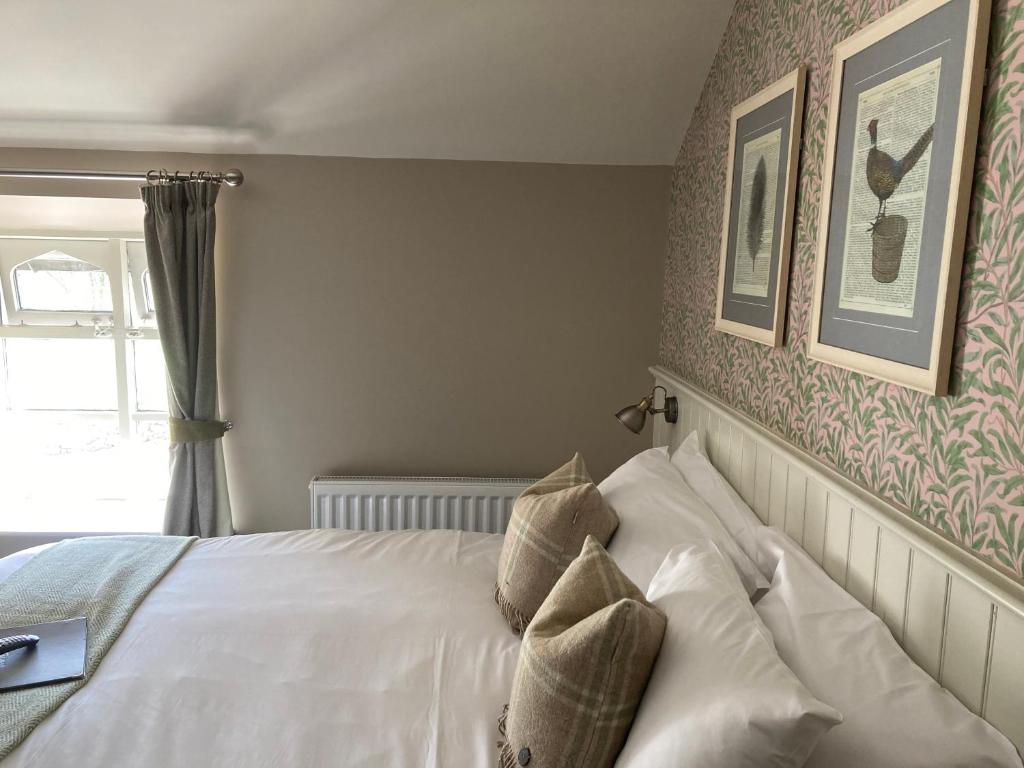 Letto o letti in una camera di The Stork Hotel