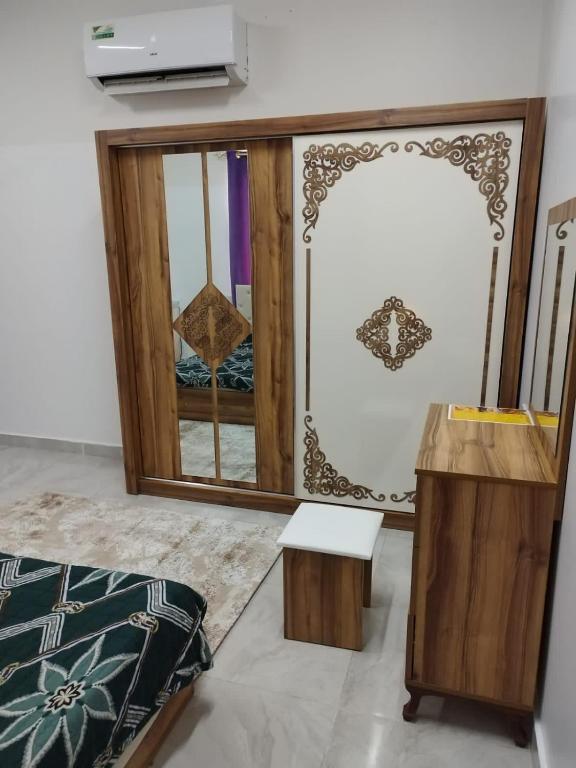 Postel nebo postele na pokoji v ubytování غرف للإيجار اليومي