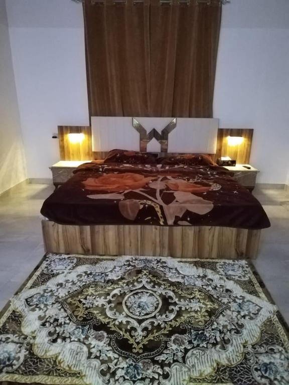 Postel nebo postele na pokoji v ubytování غرف للإيجار اليومي