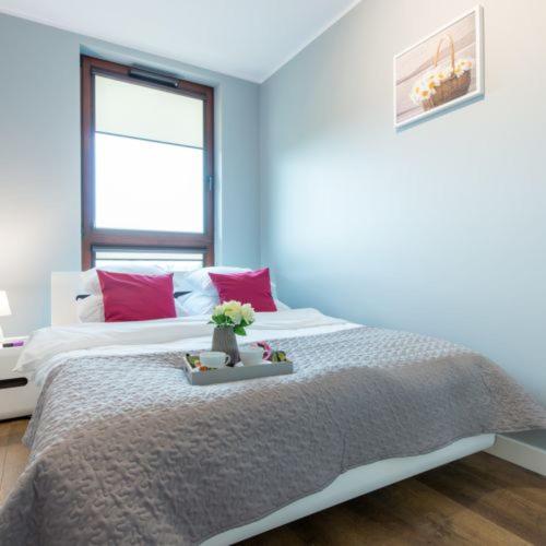 Posteľ alebo postele v izbe v ubytovaní P&O Apartments EXPO XXI - at 12B Ordona Street