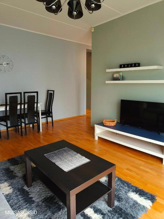 TV a/nebo společenská místnost v ubytování Chelsea Papiniidu 64 Apartment