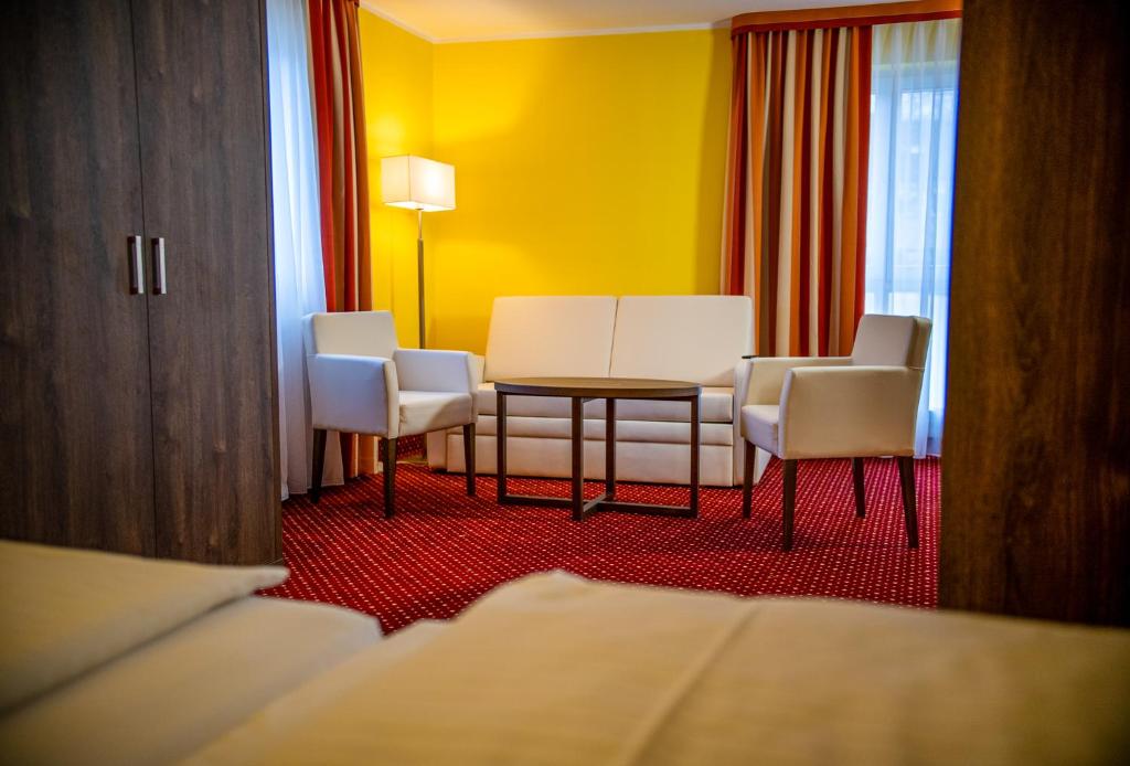 Posezení v ubytování INVITE Hotel Nürnberg City