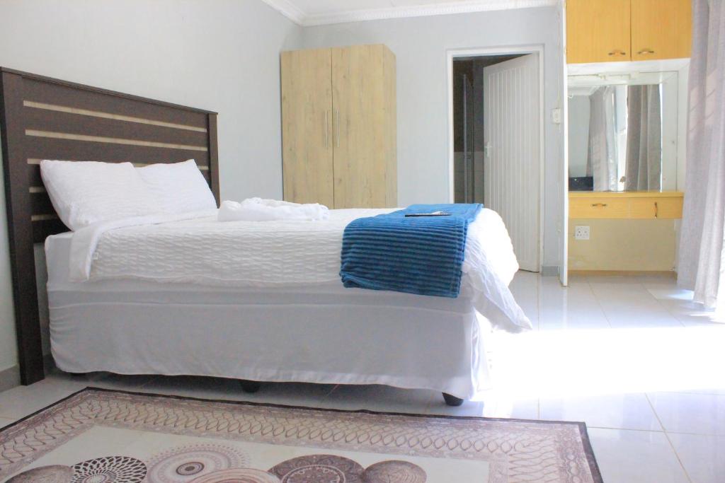 Letto o letti in una camera di Fargon Guest House