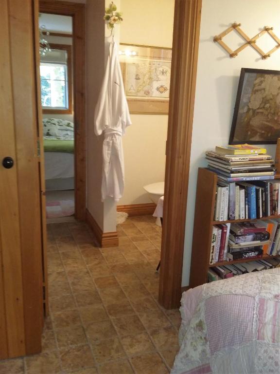 Postel nebo postele na pokoji v ubytování Bumblebee Cottage