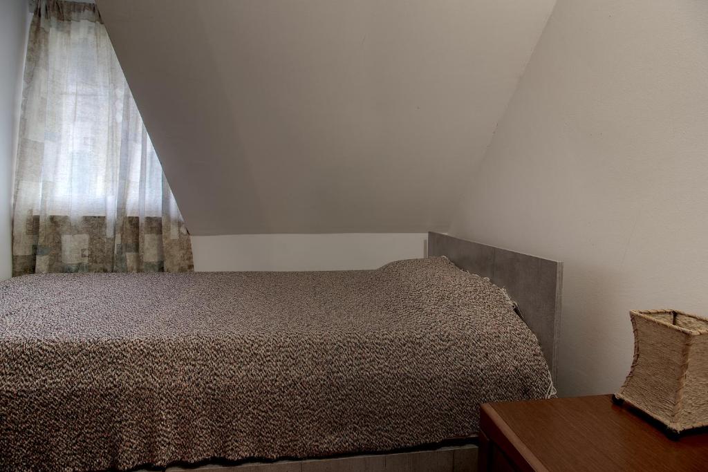 Postel nebo postele na pokoji v ubytování EcoFit Povlen