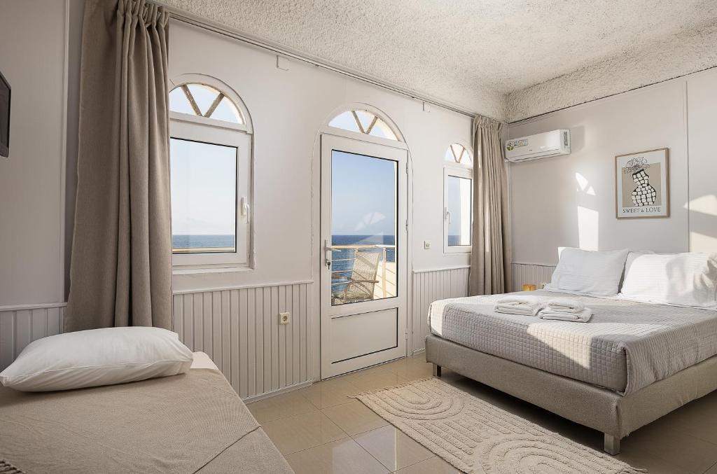 Beachfront Neachora Beachfront Suites - Chambre Triple Avec Vue Sur La Mer