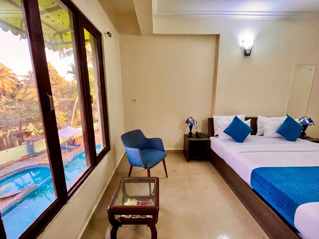 Postel nebo postele na pokoji v ubytování Shivam Four season Beach Resort, calangute Goa