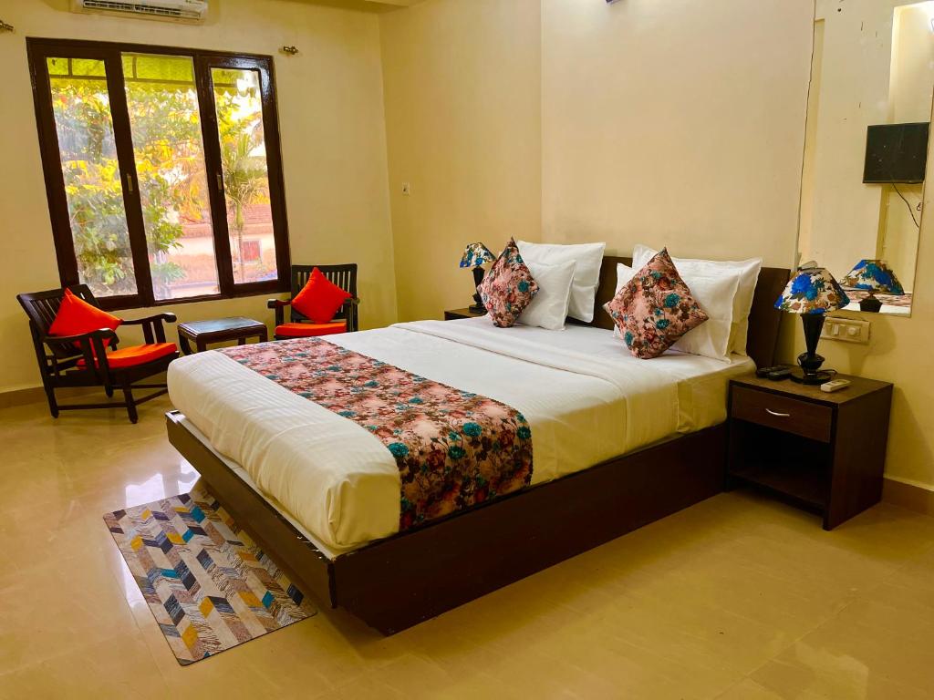 Postel nebo postele na pokoji v ubytování Shivam Four season Beach Resort, calangute Goa
