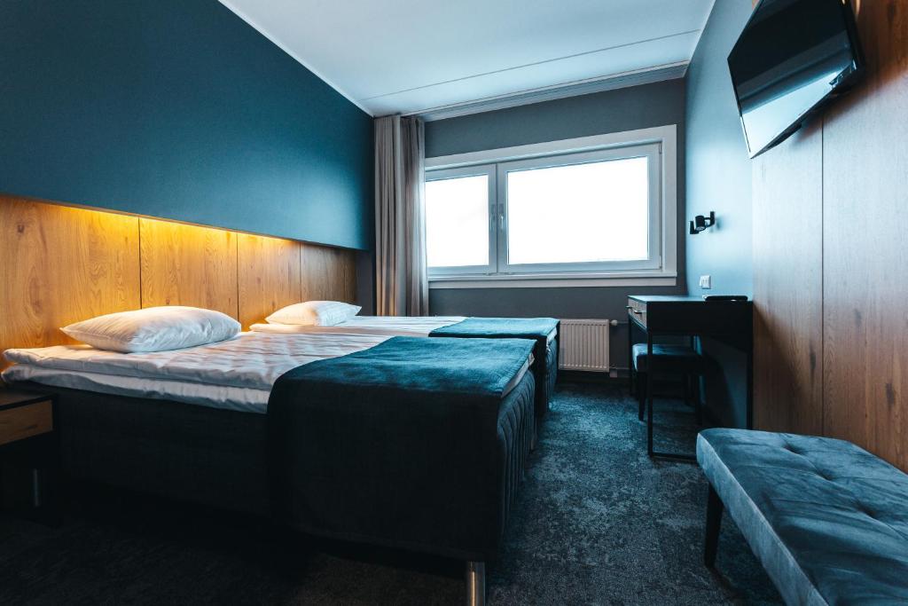 Voodi või voodid majutusasutuse Go Hotel Shnelli toas