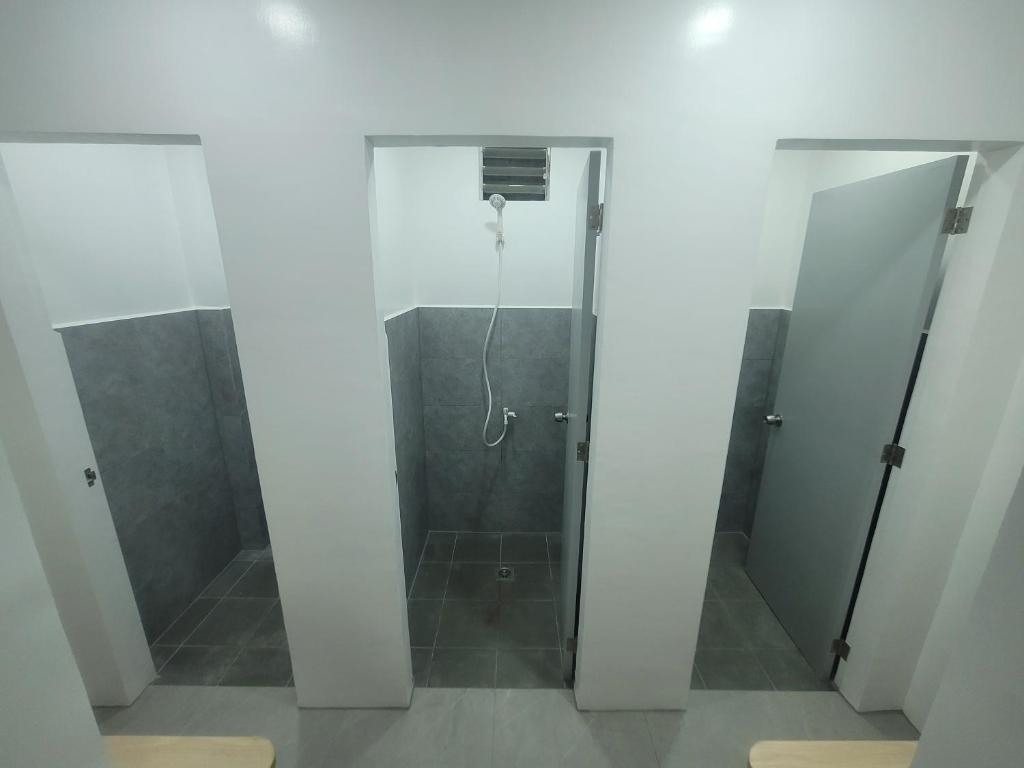 Koupelna v ubytování Capsule Hotel in Malapascua