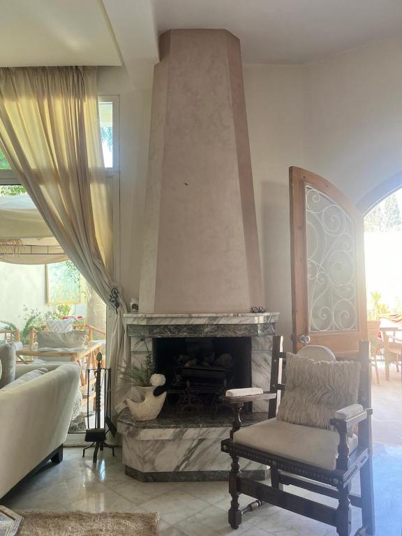Posezení v ubytování Maison d'hôte Darkom Kech