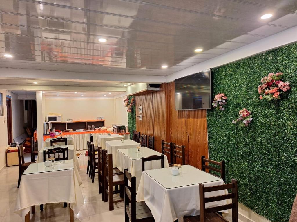 Restoran või mõni muu söögikoht majutusasutuses Andino Classic
