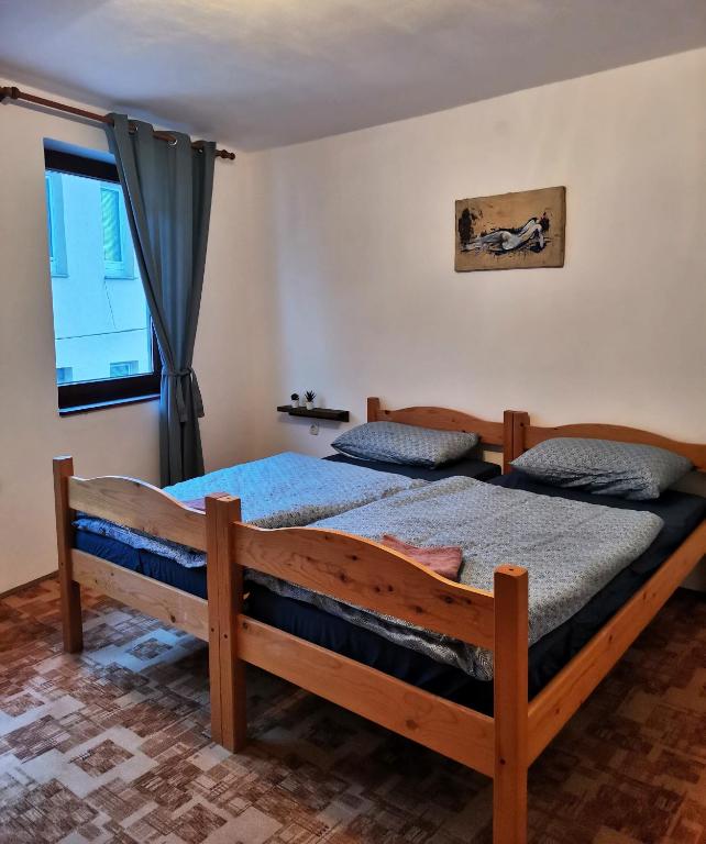 Postel nebo postele na pokoji v ubytování Sobe Pri Olivi