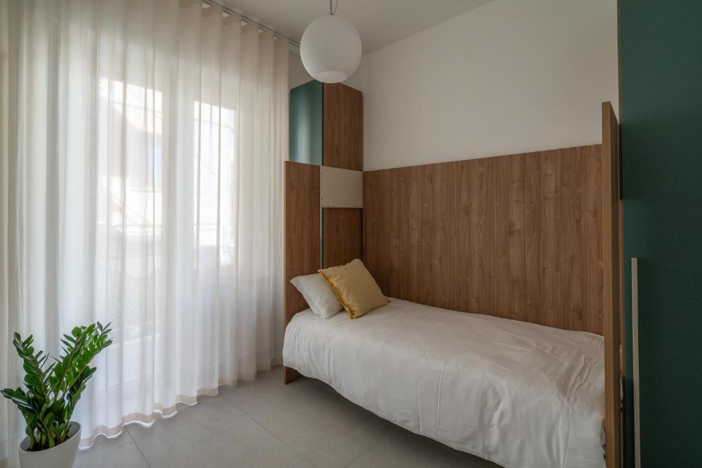 Postel nebo postele na pokoji v ubytování Frangente Home