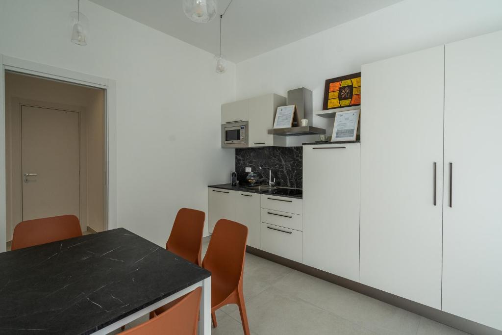 Kuchyň nebo kuchyňský kout v ubytování Frangente Home