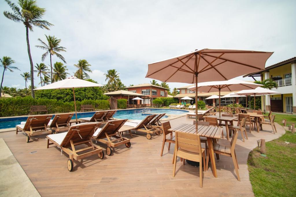 Bazén v ubytování Hotel Boutique & Spa Ponta de Inhambupe by Slaviero Hotéis nebo v jeho okolí