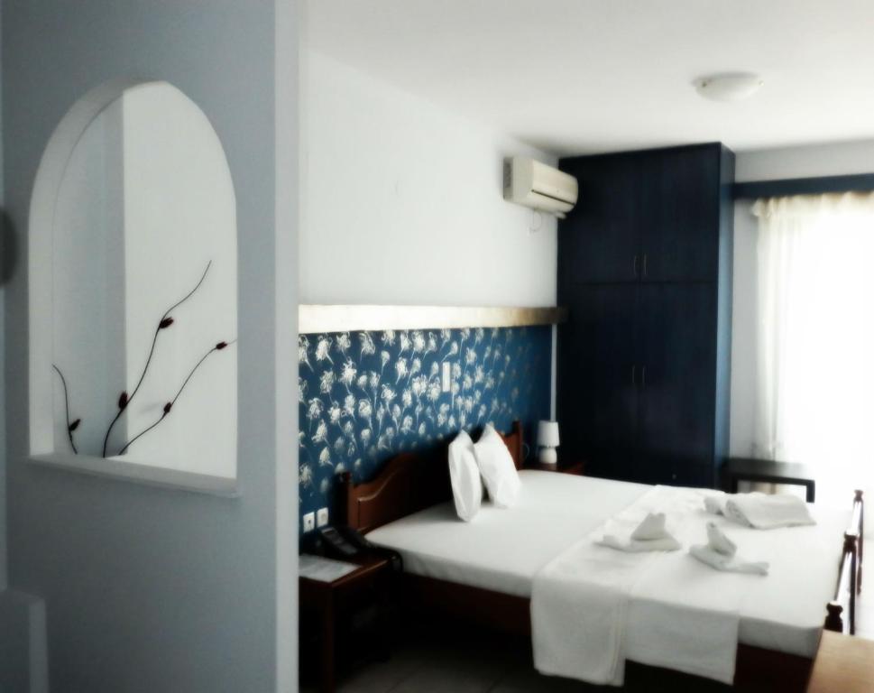 Postel nebo postele na pokoji v ubytování Sagini Boutique Hotel