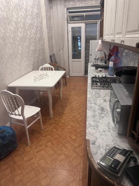 Kuchyň nebo kuchyňský kout v ubytování MI Hostel