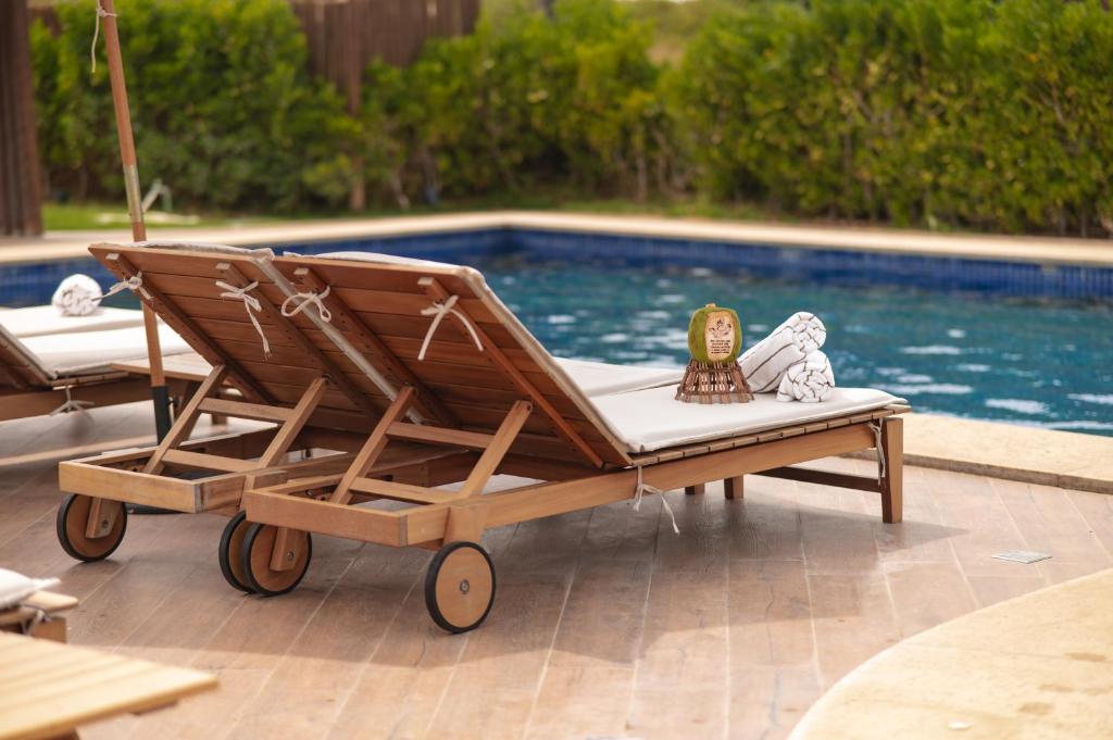 Bazén v ubytování Hotel Boutique & Spa Ponta de Inhambupe by Slaviero Hotéis nebo v jeho okolí
