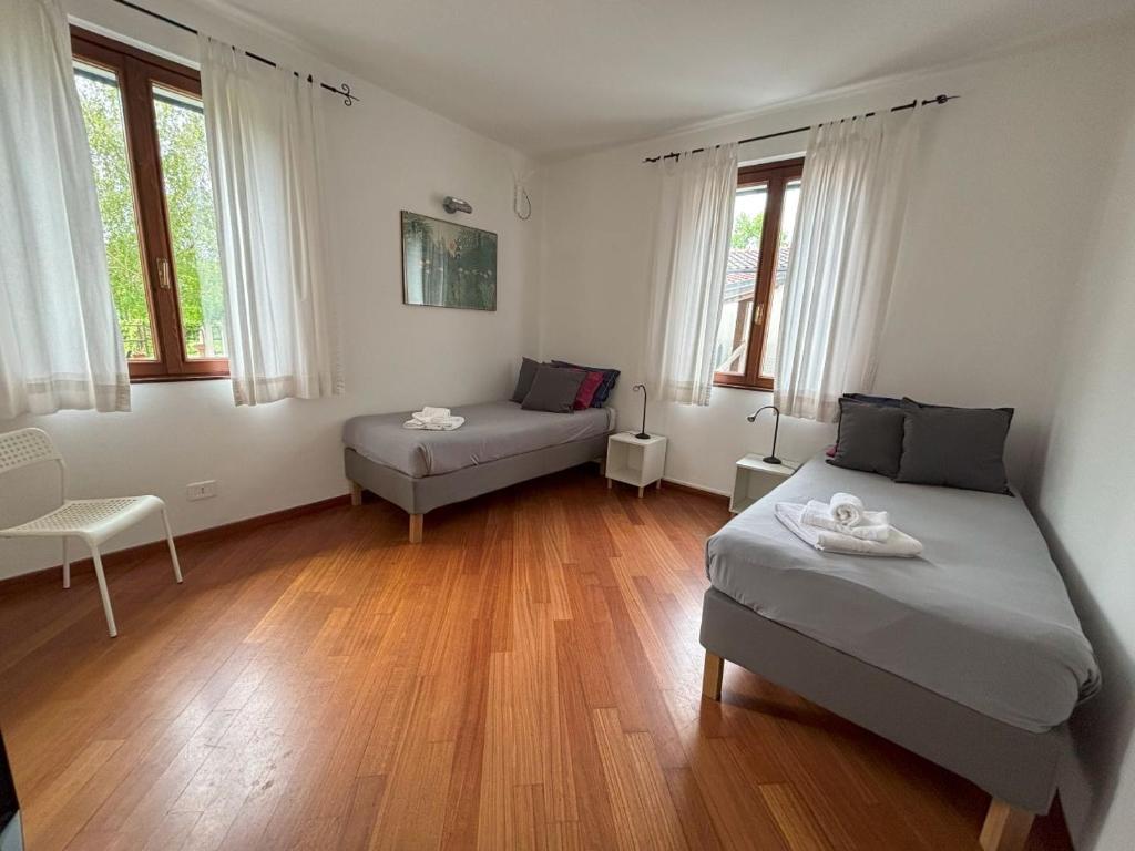 Posteľ alebo postele v izbe v ubytovaní Casa Vacanze Magnolia