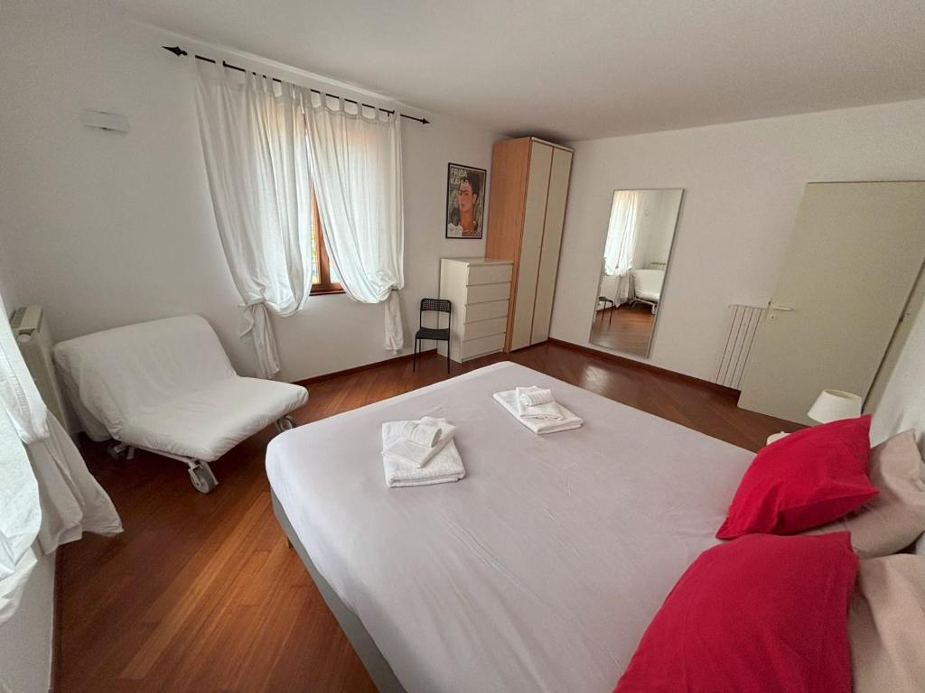 Posteľ alebo postele v izbe v ubytovaní Casa Vacanze Magnolia