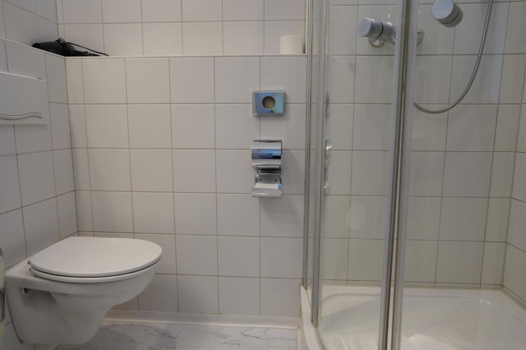 Koupelna v ubytování Hotel Ambert
