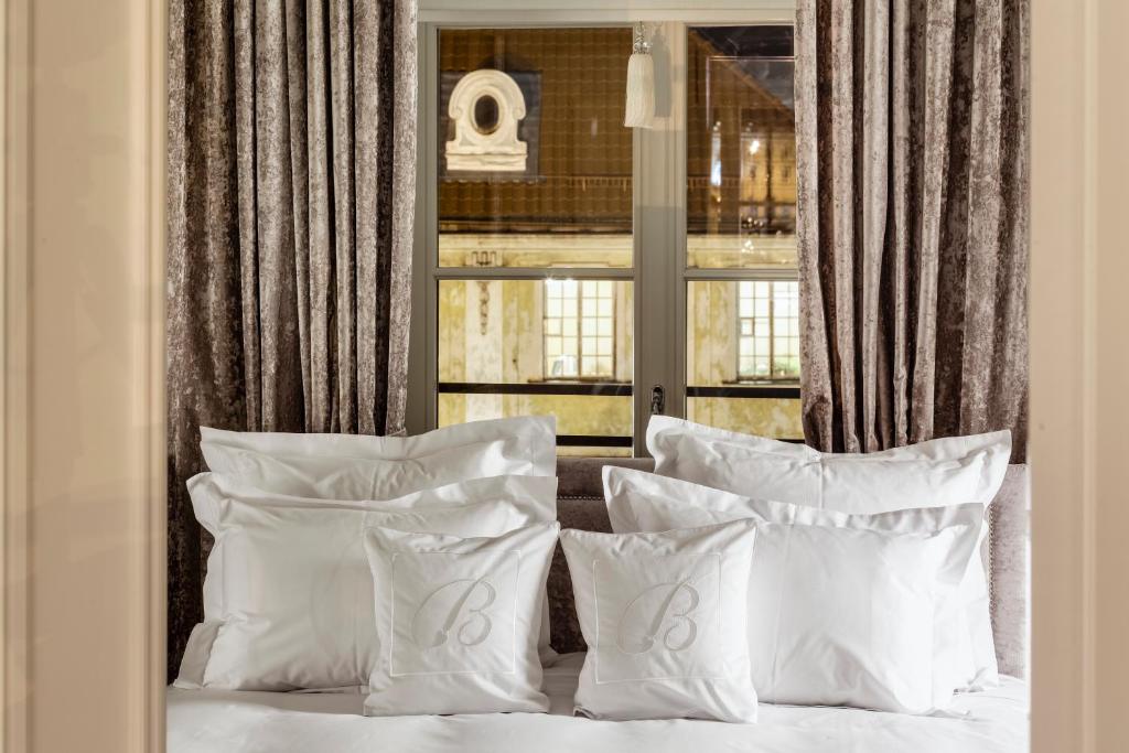 Postel nebo postele na pokoji v ubytování Hotel Bellotto