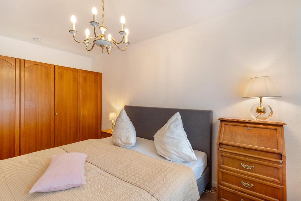 Postel nebo postele na pokoji v ubytování Ferienwohnung Wanderschön