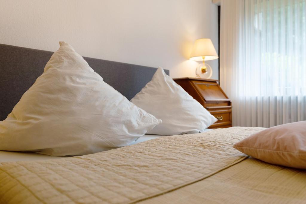 Postel nebo postele na pokoji v ubytování Ferienwohnung Wanderschön
