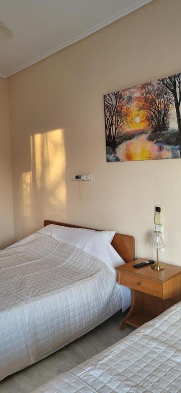 Postel nebo postele na pokoji v ubytování K SANTIS STUDIOS