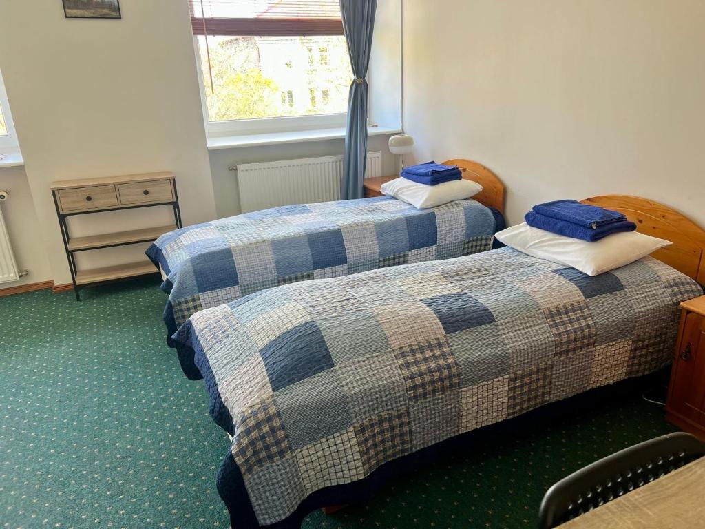 Postel nebo postele na pokoji v ubytování Paldiski Hotel