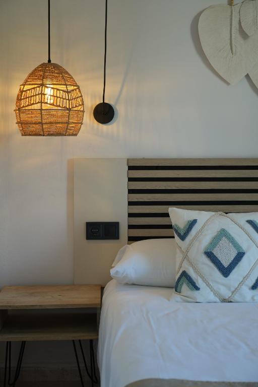 Postel nebo postele na pokoji v ubytování Apartamentos Ses Veles