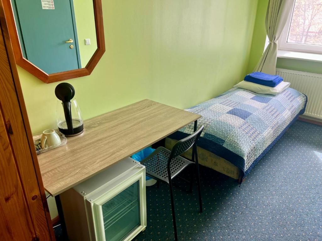 Postel nebo postele na pokoji v ubytování Paldiski Hotel