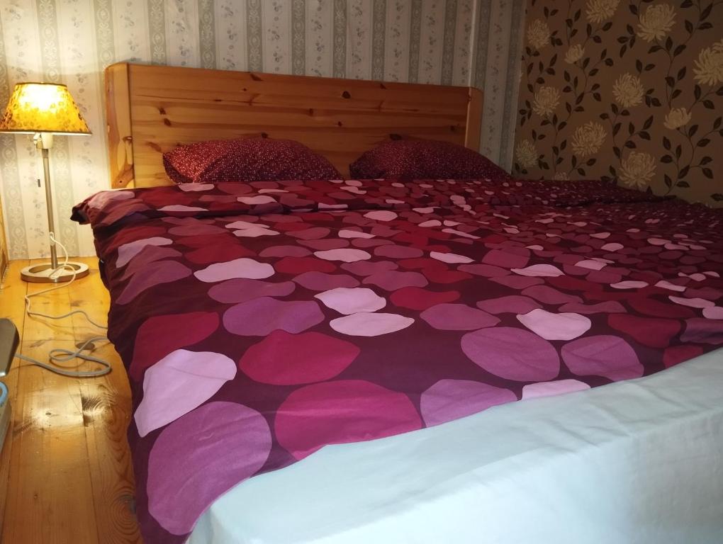 Postel nebo postele na pokoji v ubytování Cuki Apartment