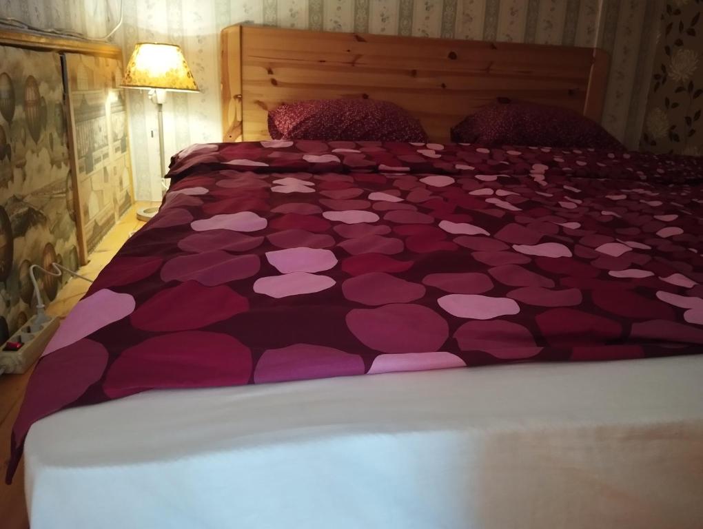 Postel nebo postele na pokoji v ubytování Cuki Apartment