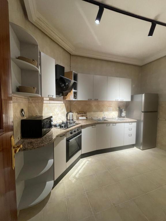 Kuchyň nebo kuchyňský kout v ubytování appart hotel lac 2 Tunis