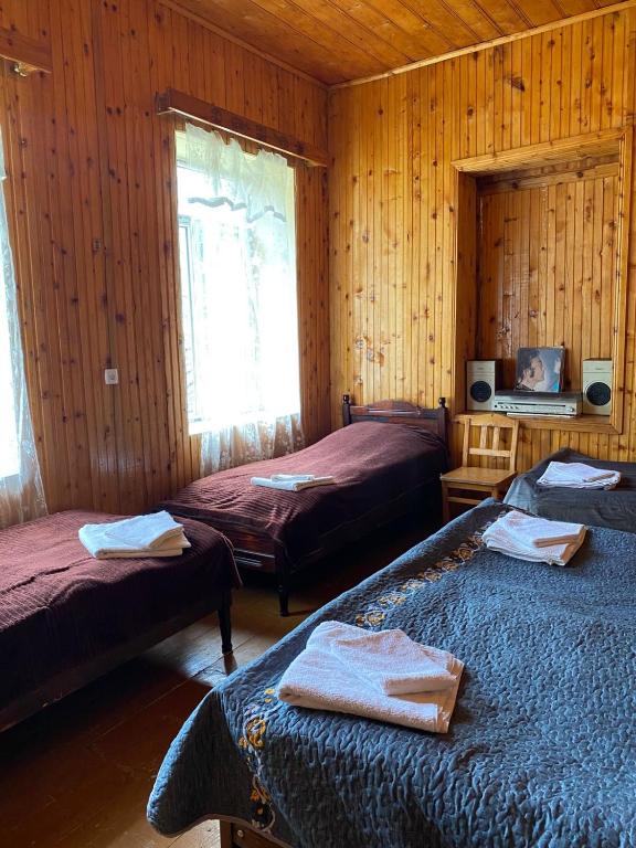 Postel nebo postele na pokoji v ubytování Lia Jamdeliani Guest House