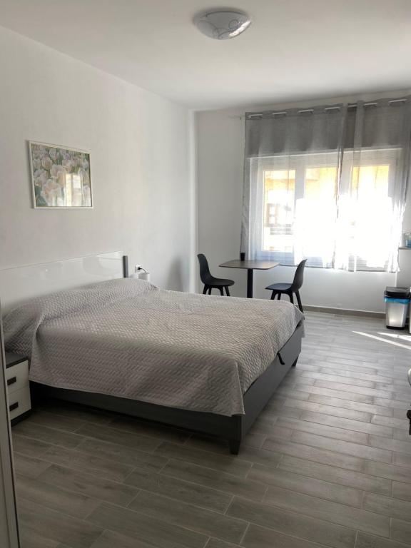 Postel nebo postele na pokoji v ubytování La Giara