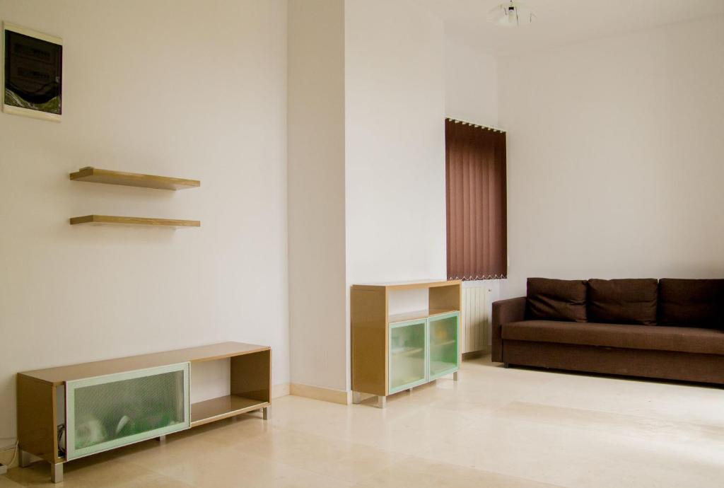 A television and/or entertainment centre at Olimp apartment with terrace