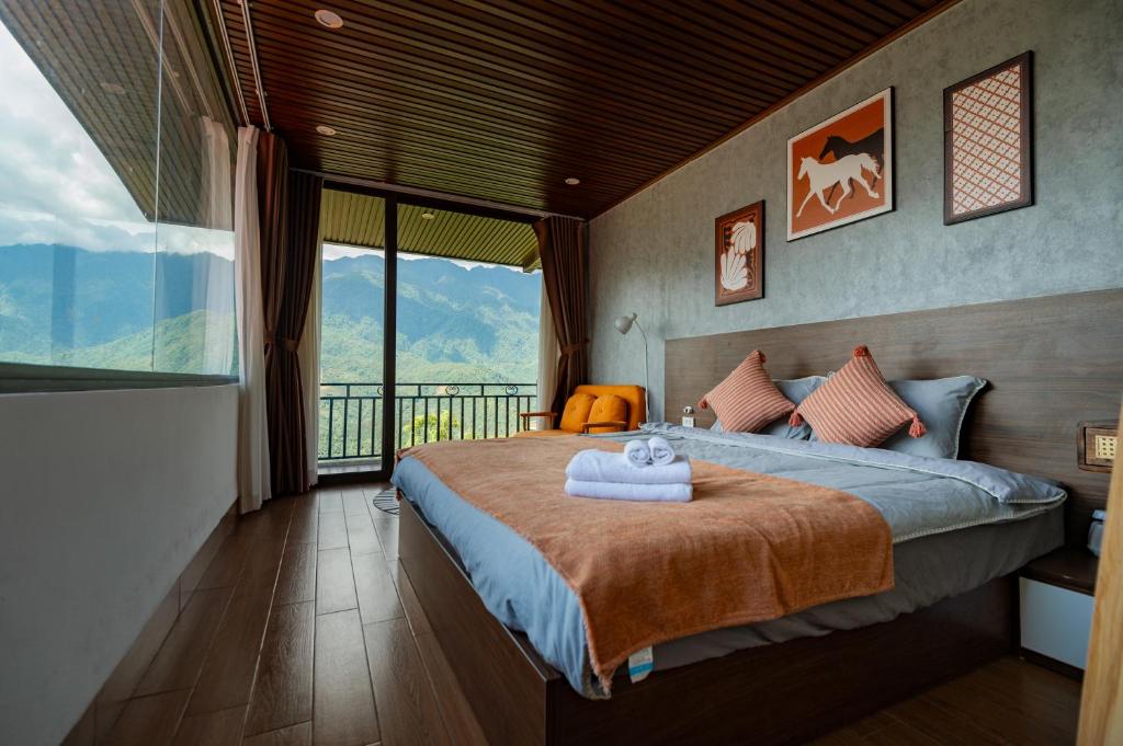 Giường trong phòng chung tại Still Cafe Home Kitchen