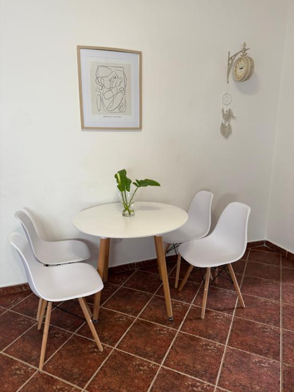 Uma área de estar em Apartment Atina