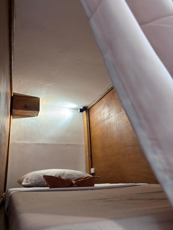Postel nebo postele na pokoji v ubytování Paradiso Hostel El nido