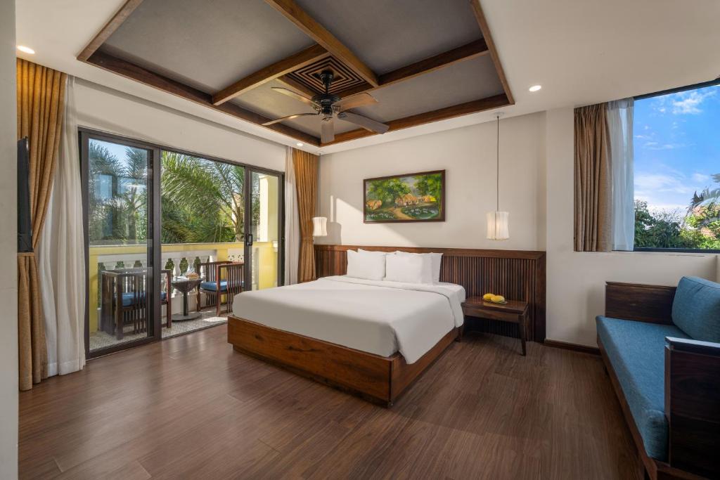 Giường trong phòng chung tại Eden Hoi An Villas