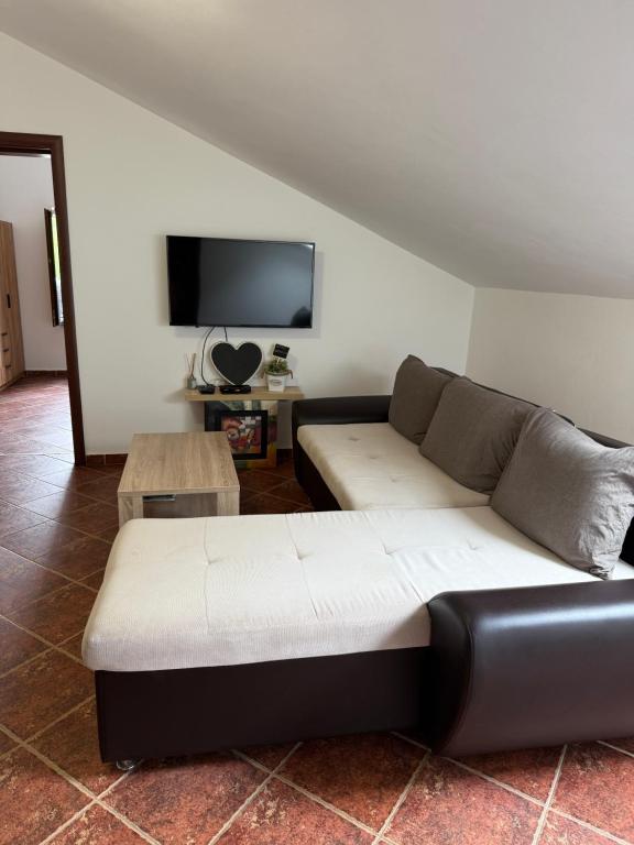 Uma televisão e/ou sistema de entretenimento em Apartment Atina